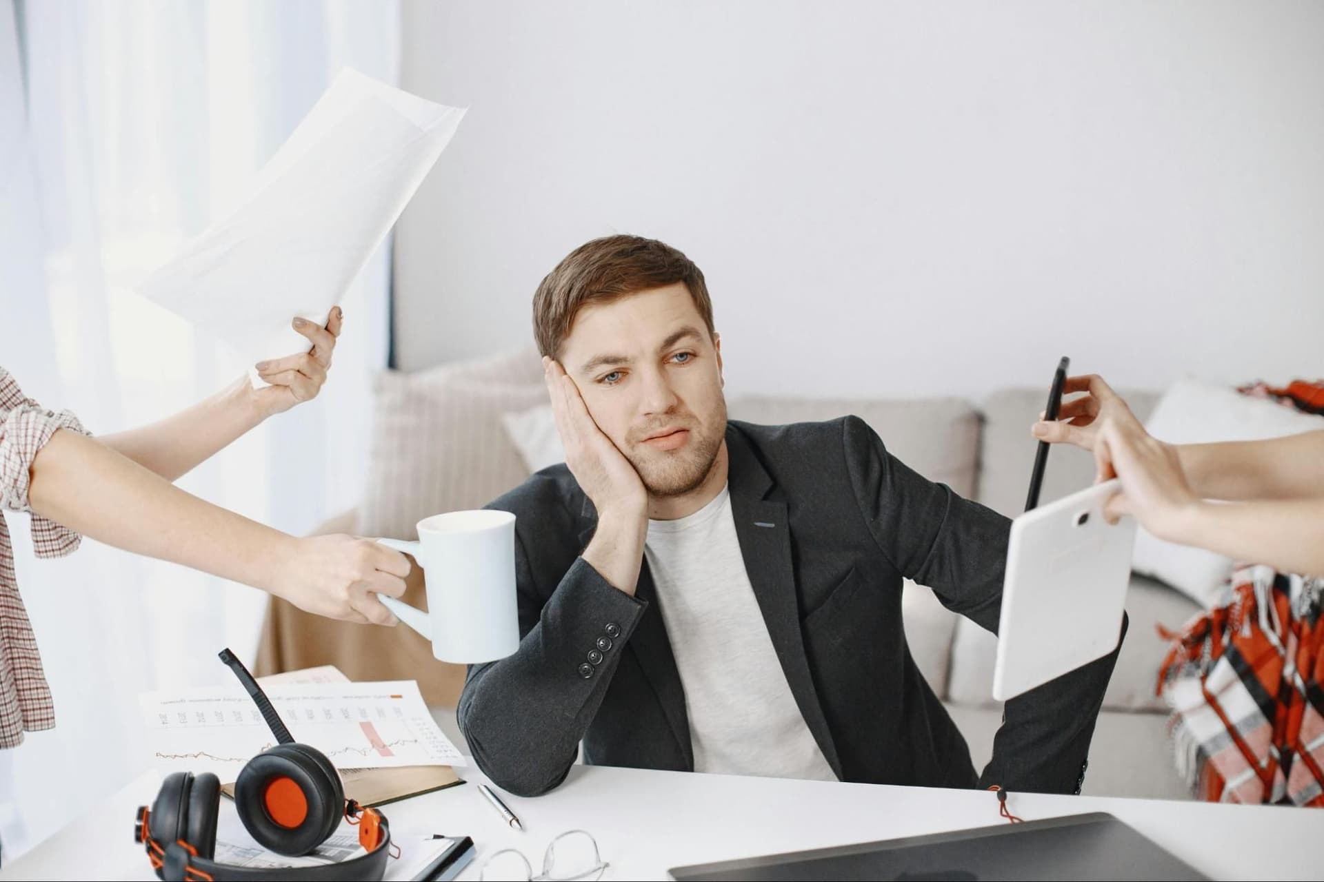 A man multitasking several tasks at once