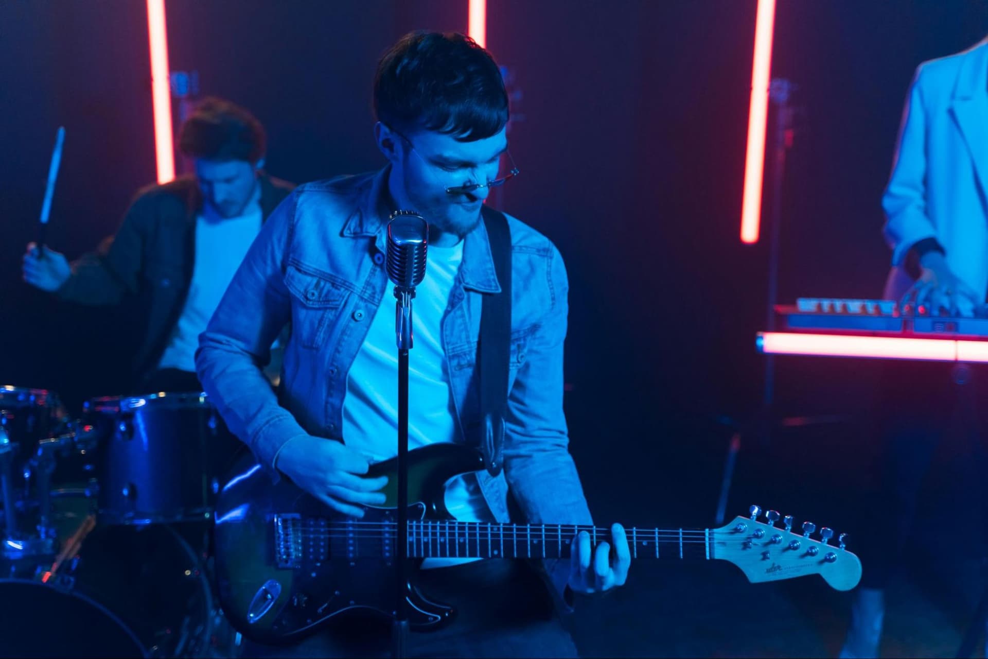 A man playing a guitar